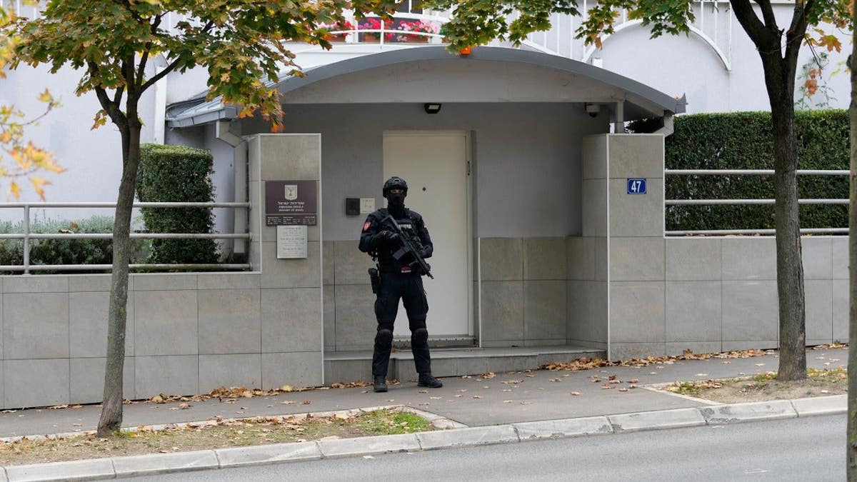 One Serbian police officer stands guard outside the Israeli embassy in Belgrade.