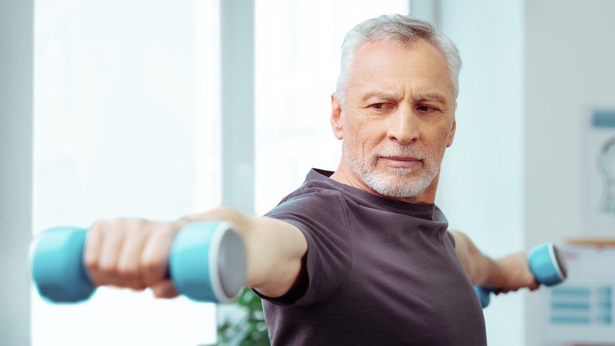 Older man with dumbbells