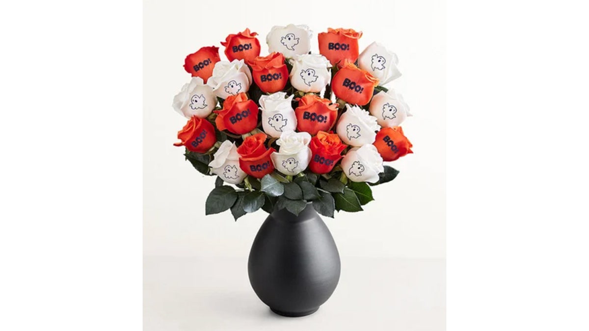 These roses have Halloween etchings on them, including a little ghost and the word "Boo."