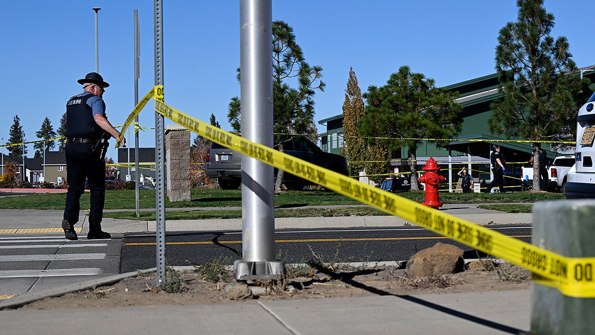 Police tape is placed outside Silver Rail Elementary school, where a shooting took place, on Thursday, Oct. 15, 2026 in Bend, Ore.