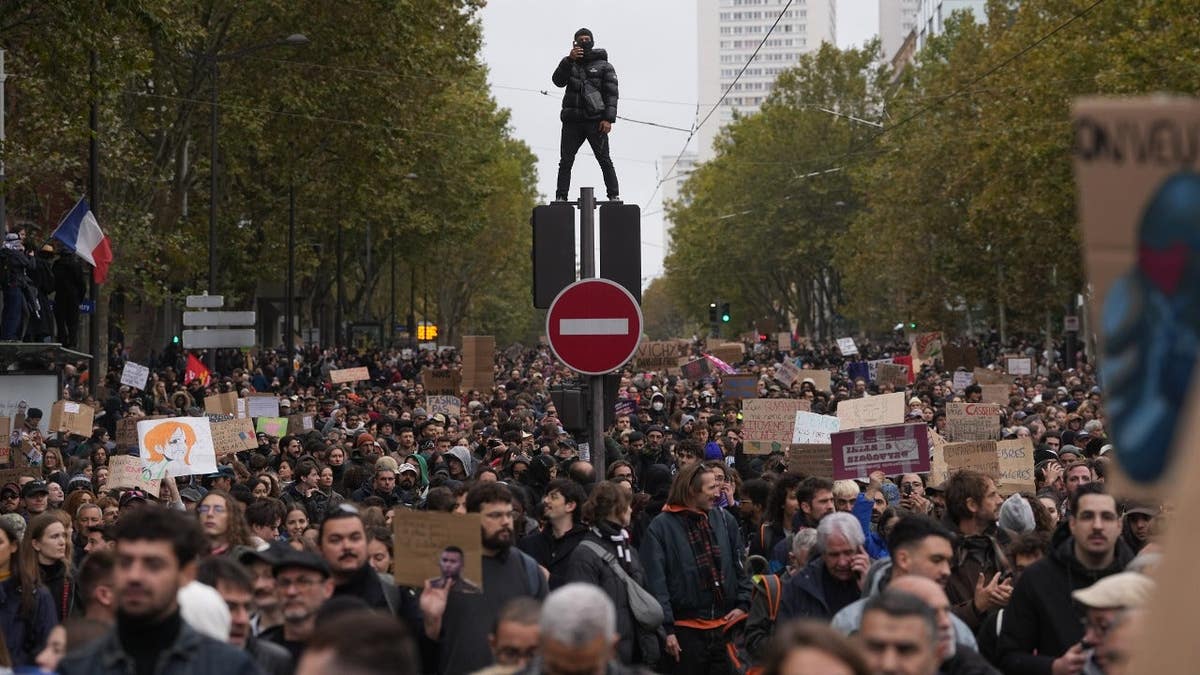 Thousands of protestors march the streets of Paris, France.