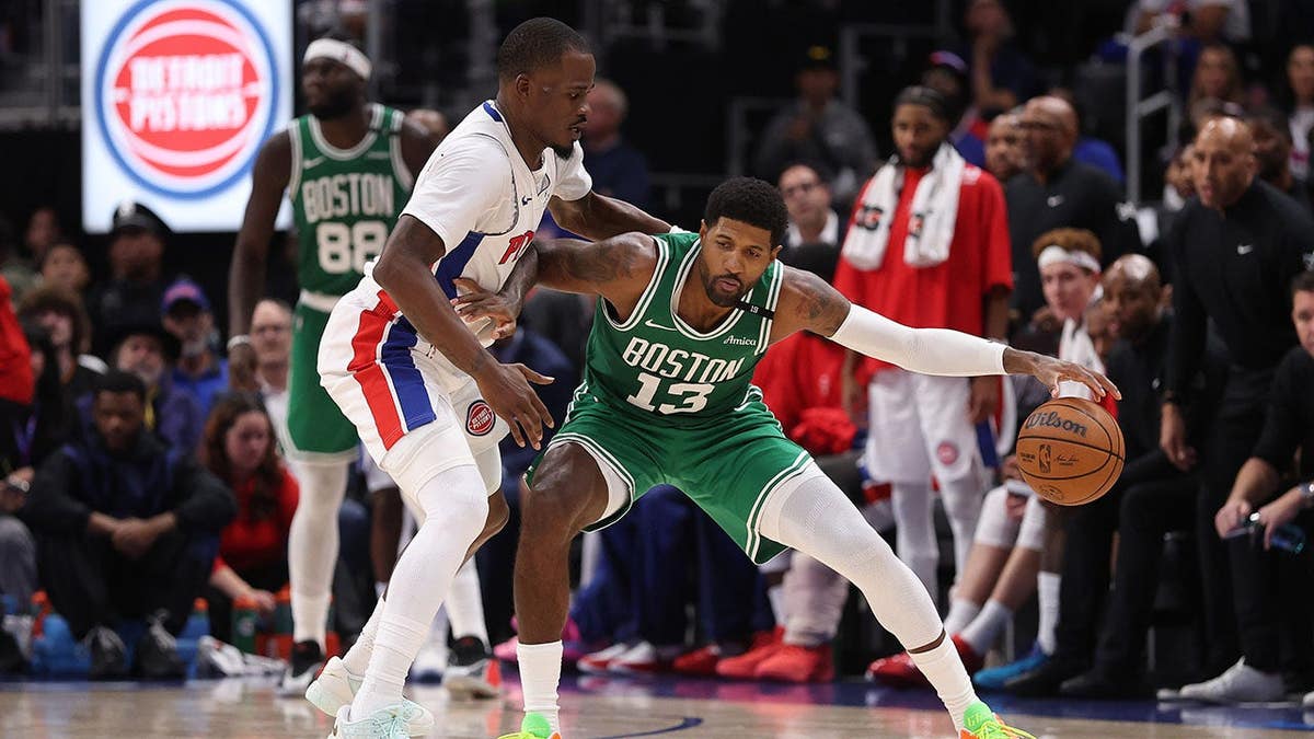 Paul George #13 of the Boston Celtics plays against the Detroit Pistons.