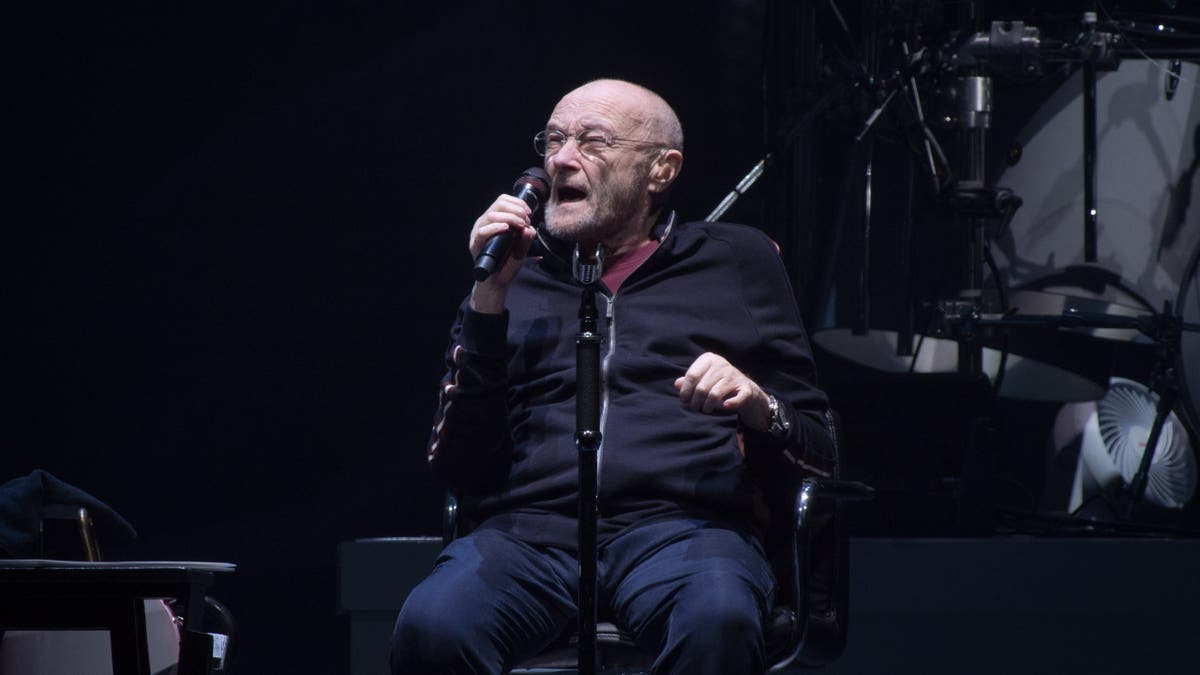 Phil Collins performs on stage at U Arena in Nanterre, France.