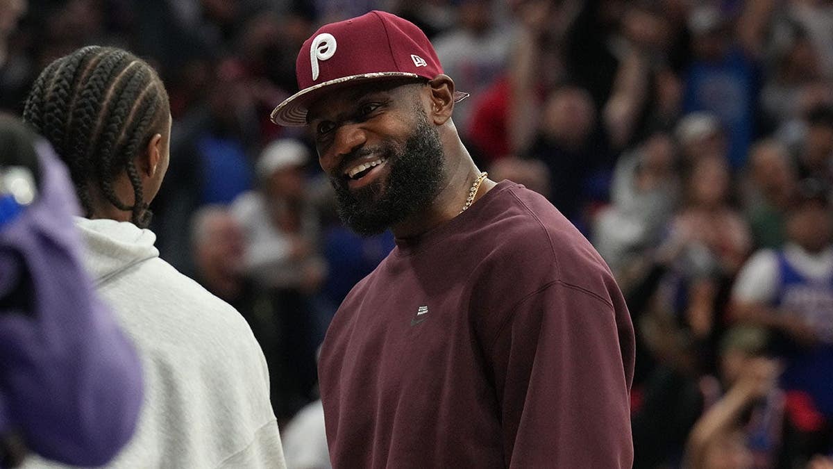 LeBron James smiles during a 76ers game against the Knicks in Philadelphia.