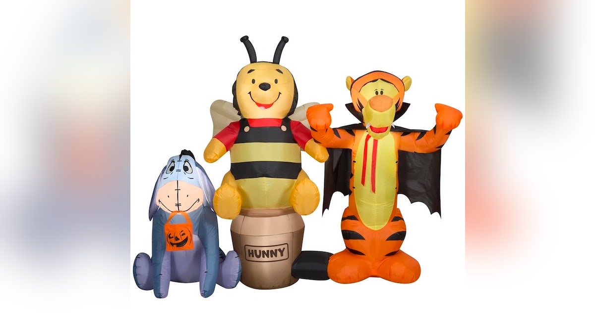 Winne the Pooh and his friends are ready to trick-or-treat with this cute inflatable. 