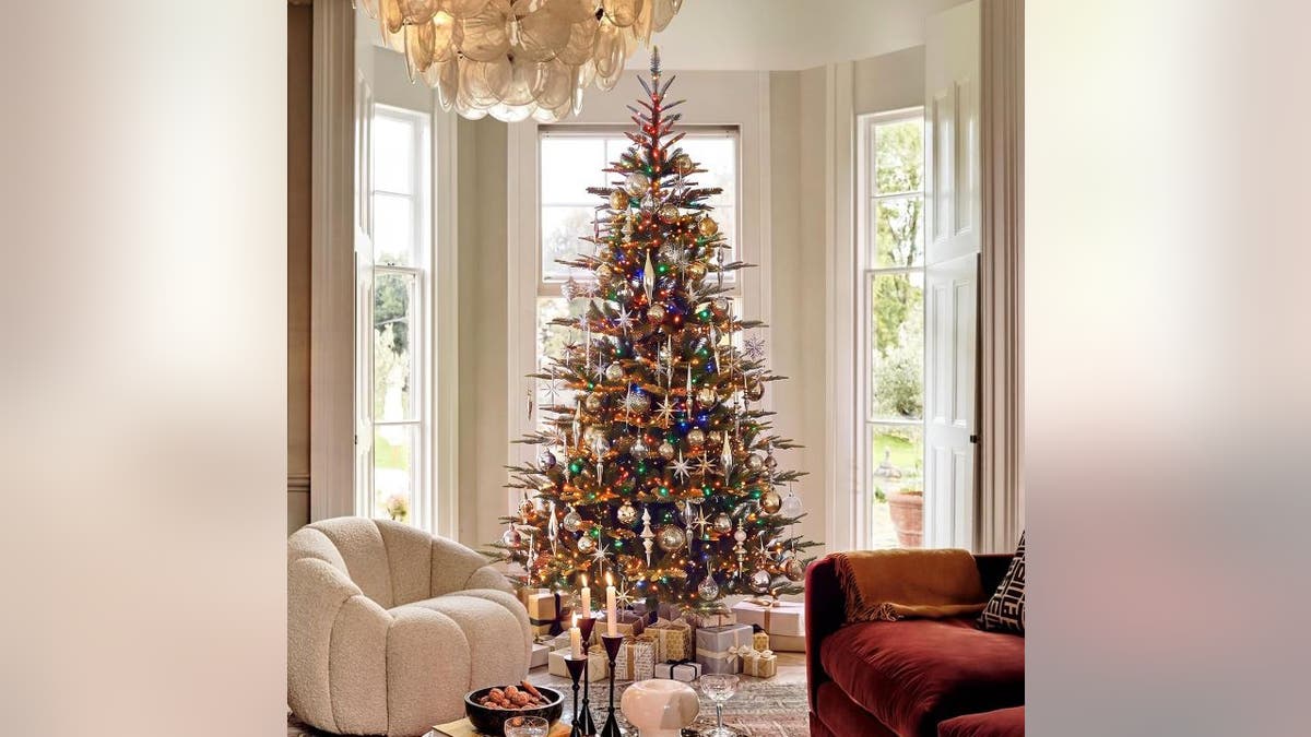 This pre-lit artificial tree offers an alternative to buying a fresh tree each year.