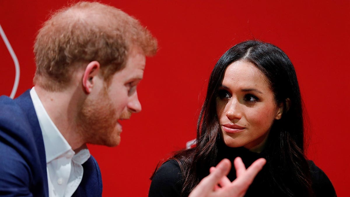 Prince Harry and Meghan Markle visit a charity fair in Nottingham, England.