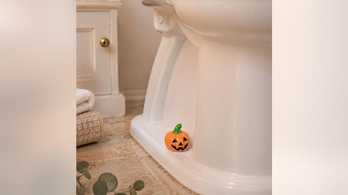 Decorate unsightly spots with Halloween decor.