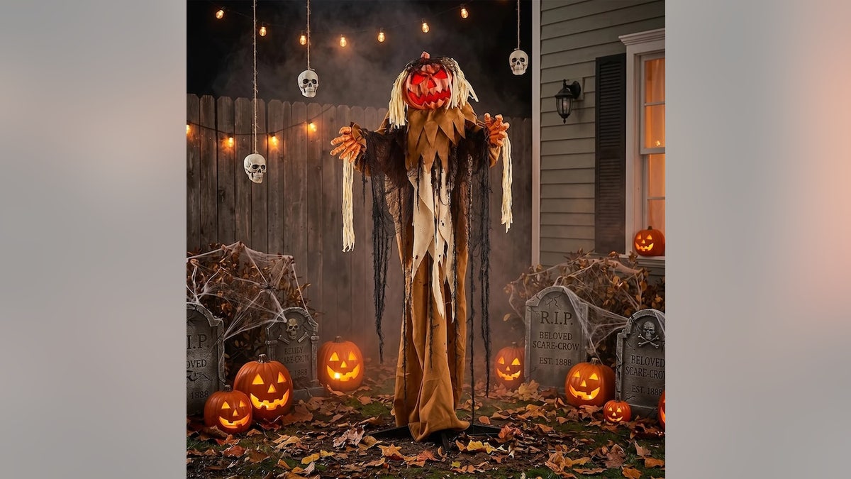 This frightening pumpkin monster stands 5.5 feet tall.