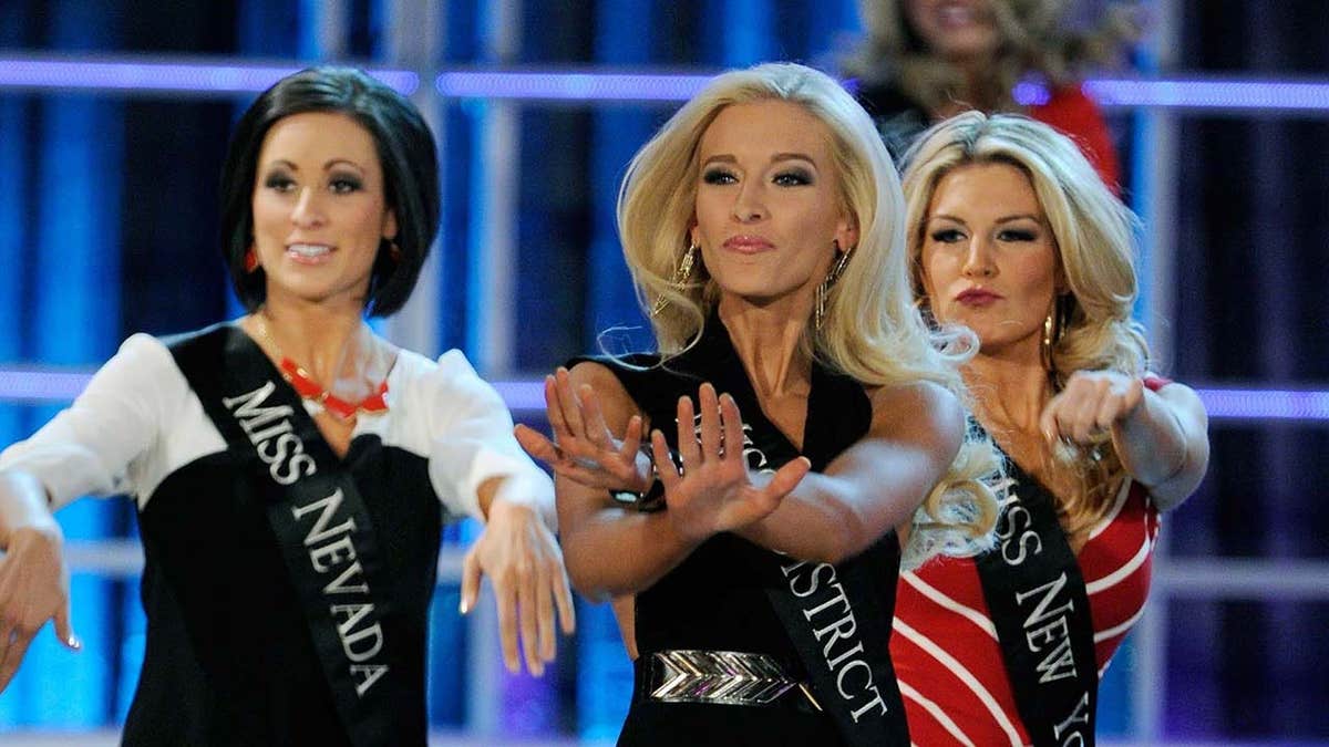 Allyn Rose, Miss District of Columbia, performs with Randi Sundquist and Mallory Hytes Hagan during the 2013 Miss America Pageant opening.