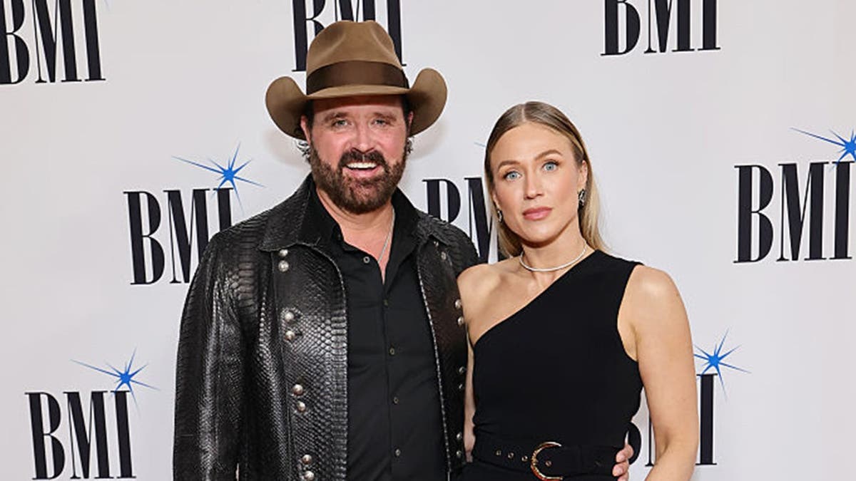 Randy Houser and Tatiana Houser attend the BMI Country Awards.