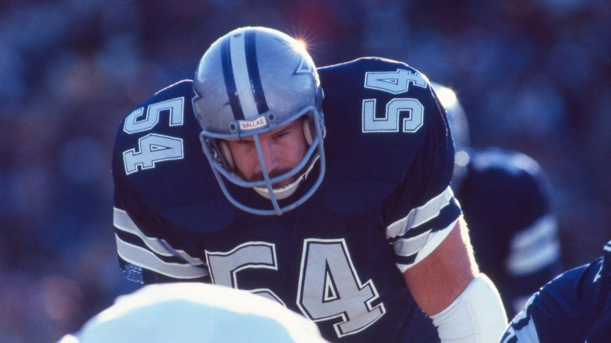 Randy White, Dallas Cowboys defensive tackle, gets set for a snap during a game.