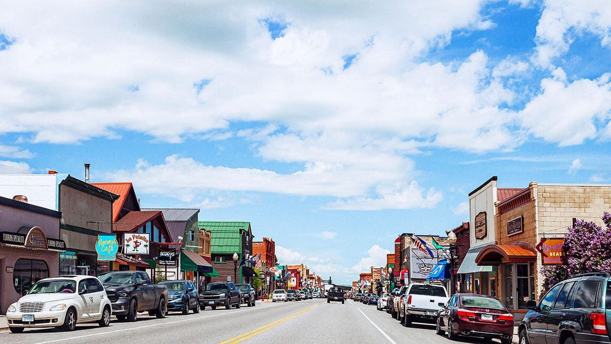 Colorful Main Street buildings line a street in Red Lodge, Montana.