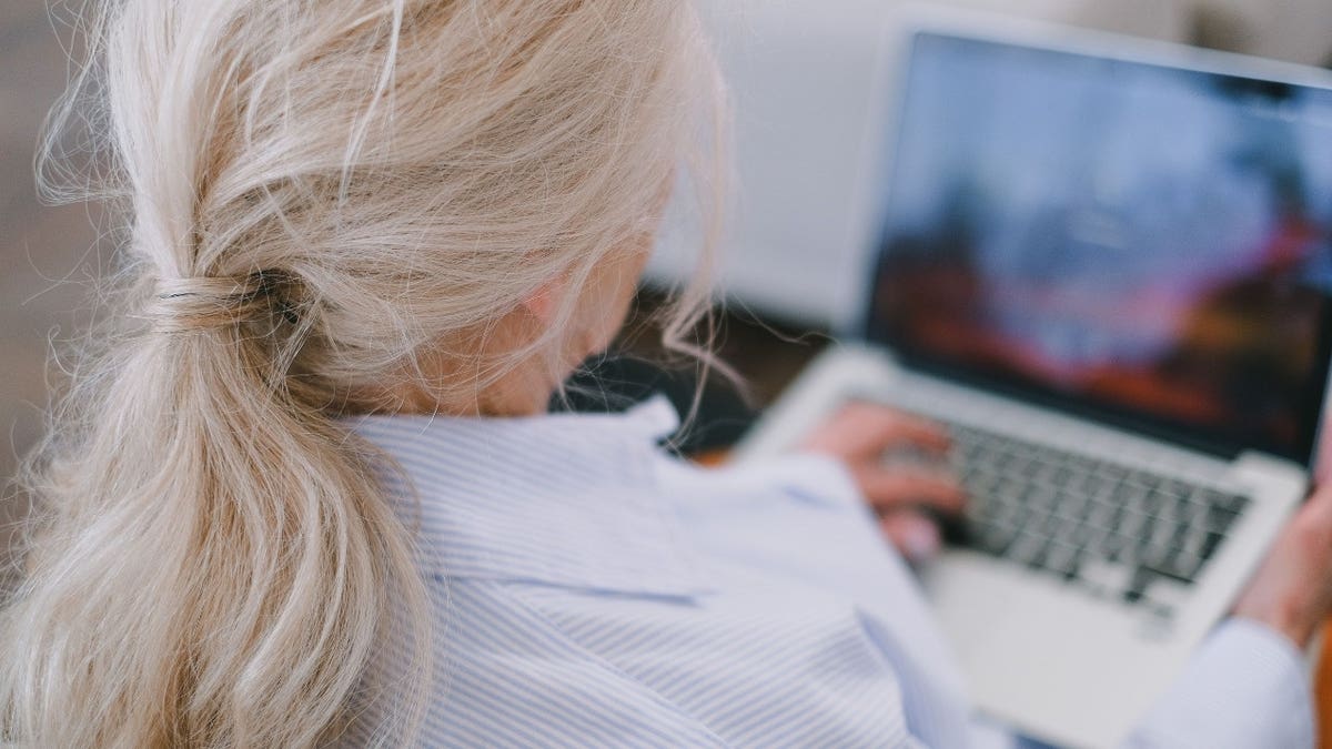 A person on a laptop