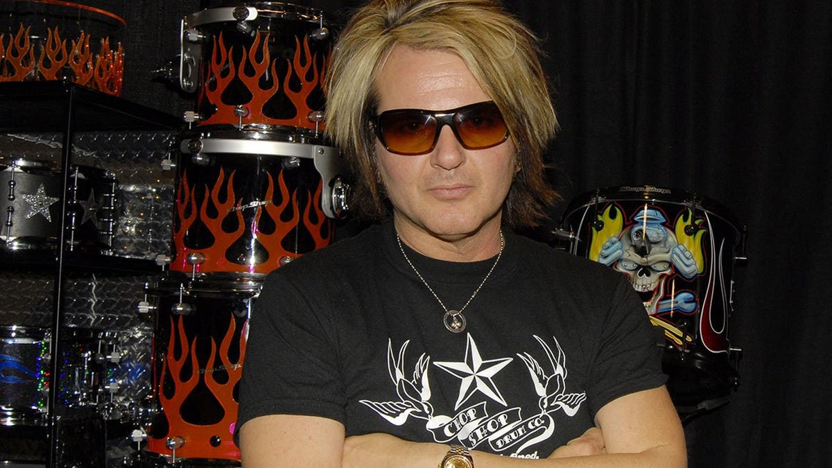 Rikki Rockett of Poison poses for a photo.