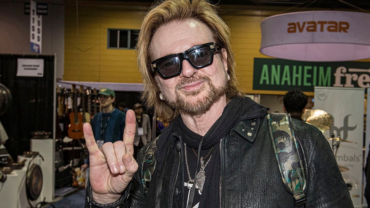 Rikki Rockett of Poison poses at the Anaheim Convention Center.