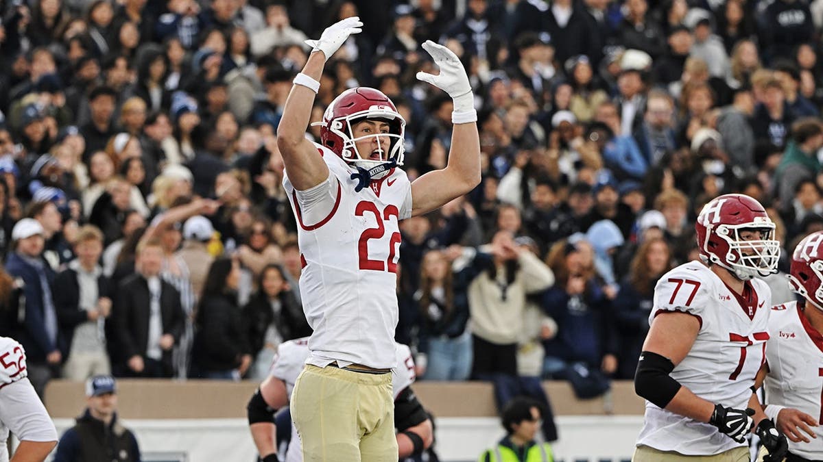 Ryan Tattersall celebrates after scoring a touchdown against Yale at Yale Bowl.