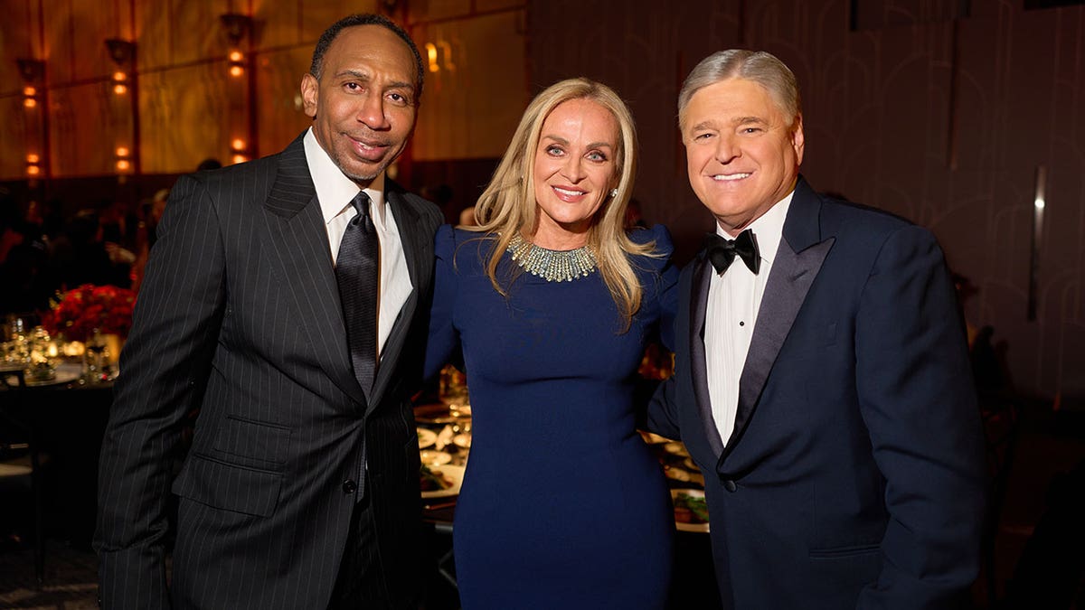 Stephen A. Smith, FOX News Media CEO Suzanne Scott and Sean Hannity.