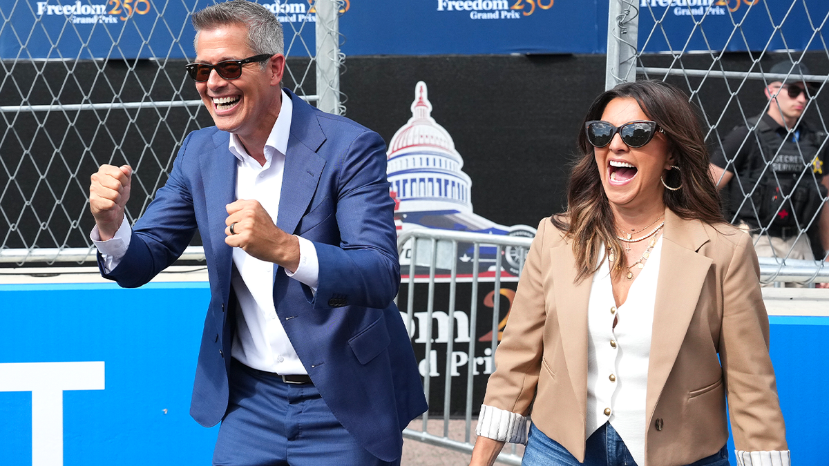 Transportation Secretary Sean Duffy and Rachel Campos-Duffy watch IndyCar race.