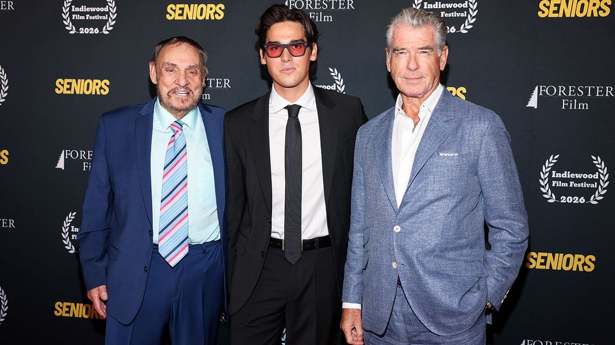 John Rhys-Davies, Paris Brosnan and Pierce Brosnan at the Los Angeles premiere of