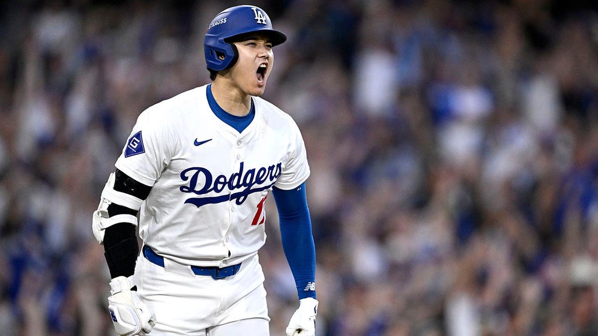 Shohei Ohtani celebrates after hitting a three-run home run at Dodger Stadium.