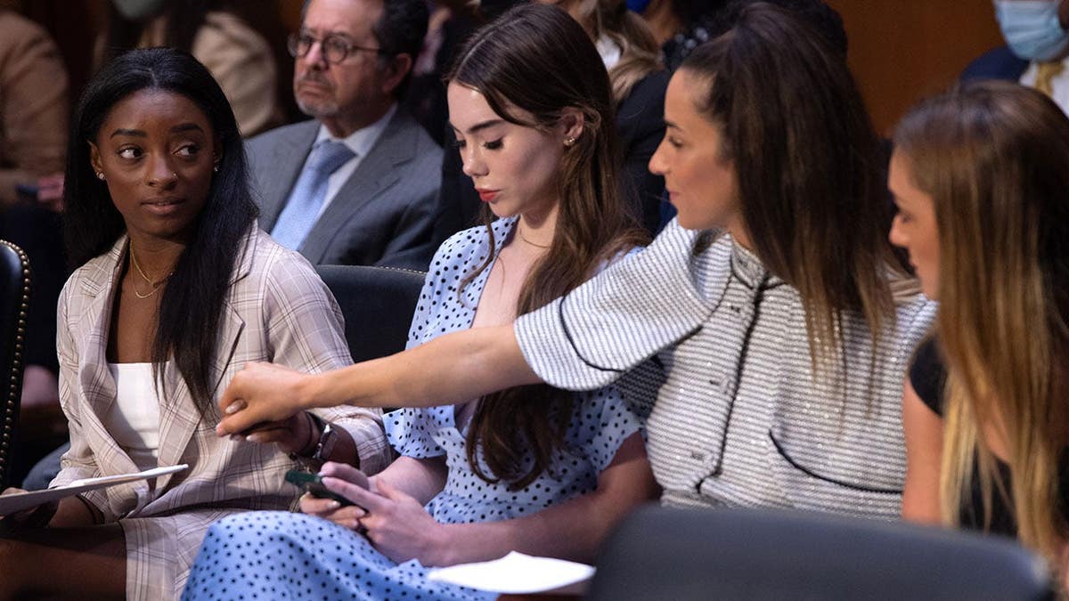 Simone Biles, McKayla Maroney, Aly Raisman and Maggie Nichols arrive to testify on Capitol Hill.