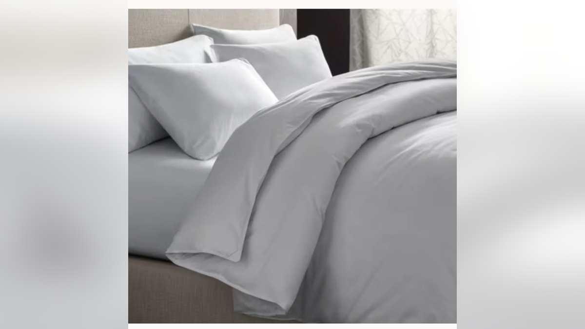 A down comforter adds some weight to your bedding.