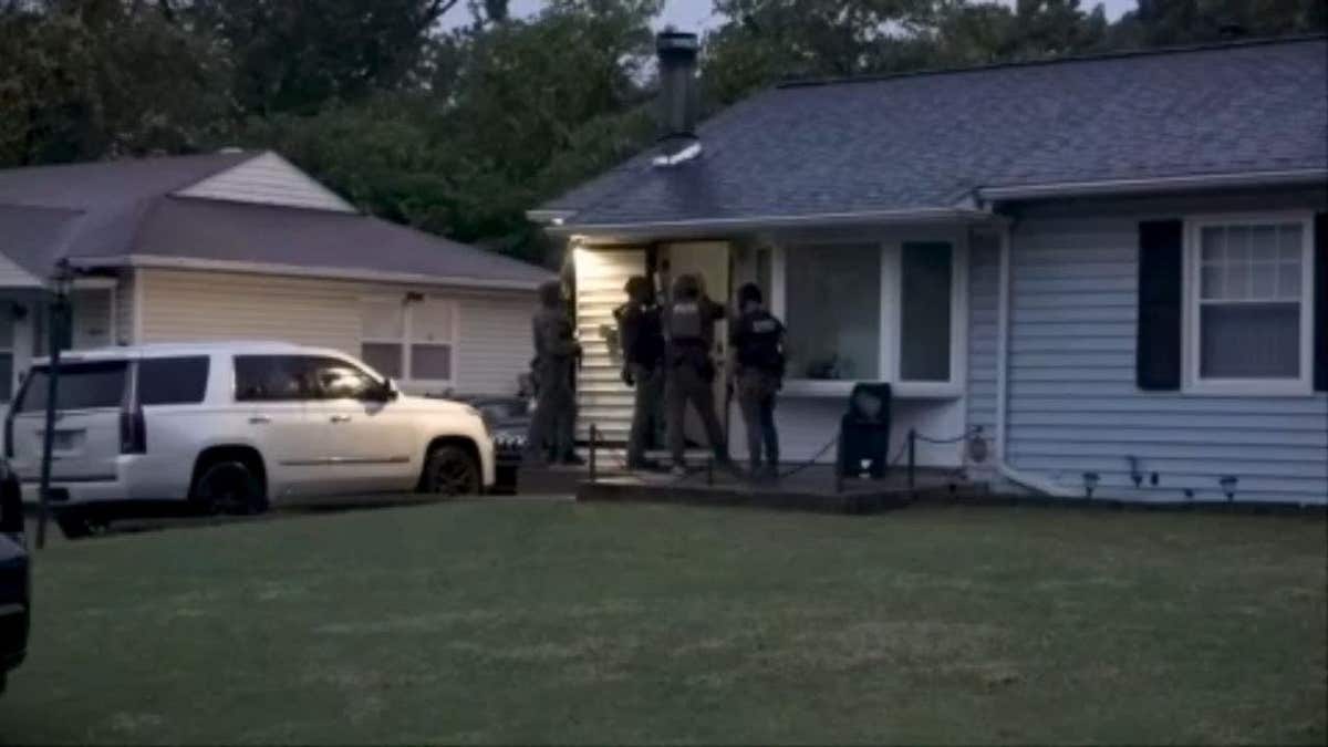 Federal authorities execute an arrest in St. Louis, Missouri, on Wednesday, October 14, 2026.