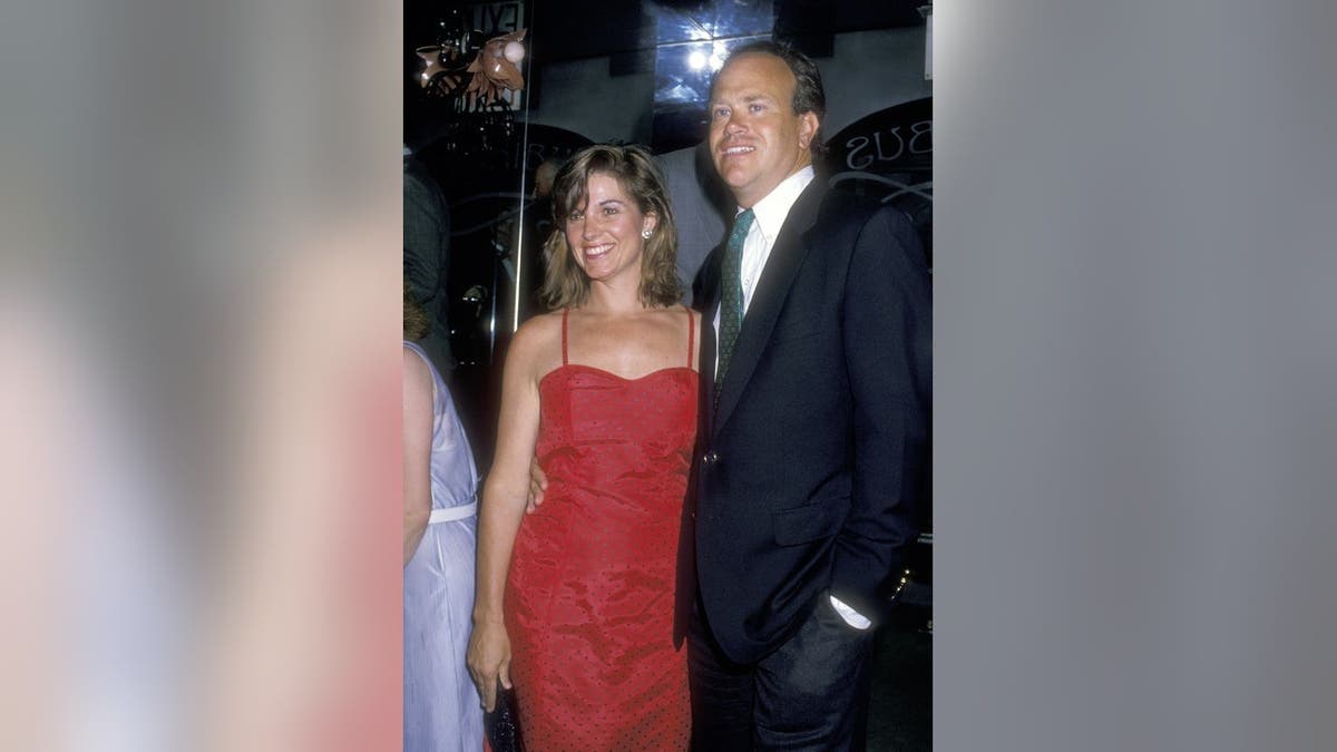 Susan Saint James and Dick Ebersol stand together at Maxim's Restaurant.