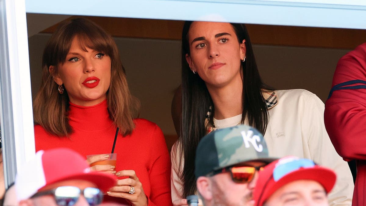 Taylor Swift and Caitlin Clark watch a game at Arrowhead Stadium.