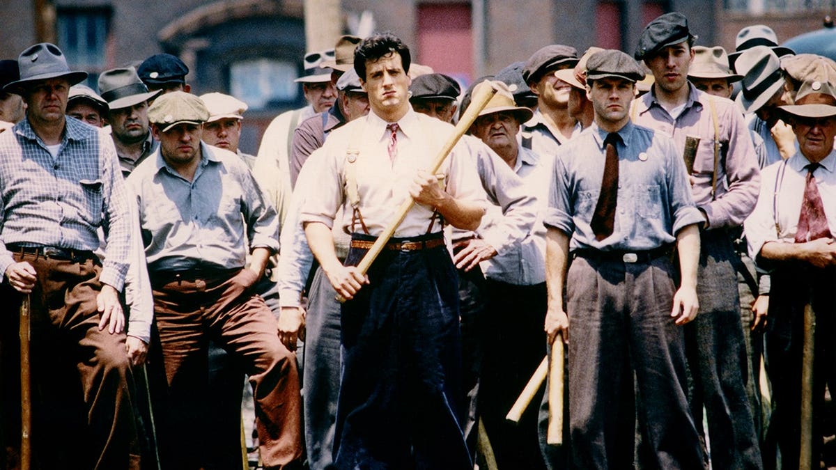 Sylvester Stallone stands on the set of F.I.S.T.