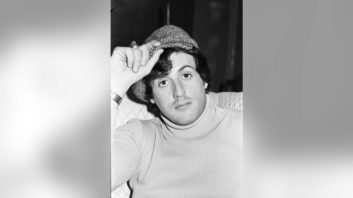 Sylvester Stallone poses in London promoting Rocky.