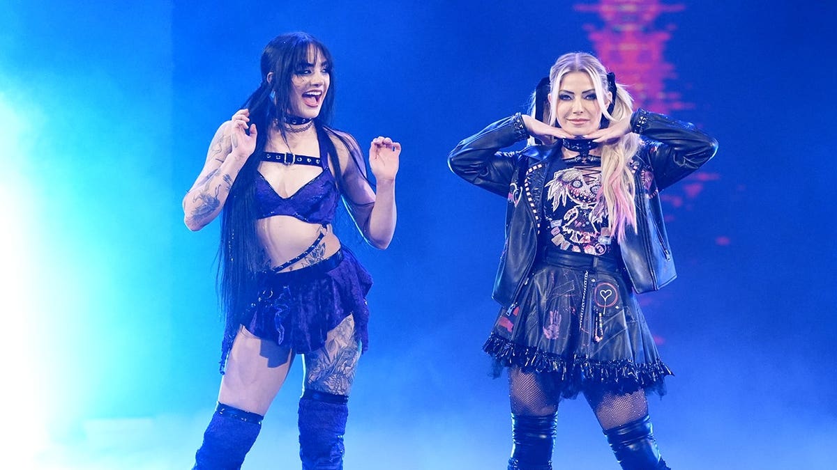Tatum Paxley and Alexa Bliss make their entrance during SmackDown.