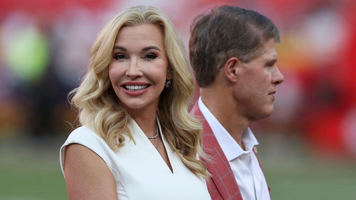 Tavia Hunt stands before an NFL preseason game at Arrowhead Stadium in Kansas City, Mo.