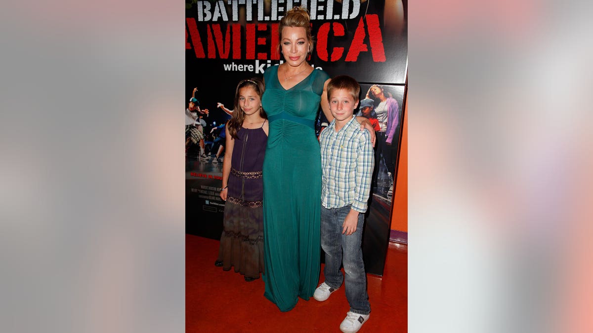 Taylor Dayne and her children at the premiere of Battlefield America.