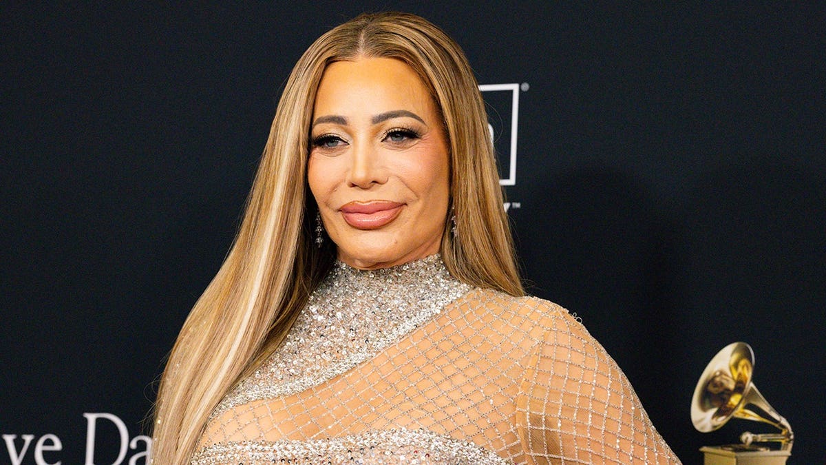 Taylor Dayne poses on the red carpet at the Beverly Hilton during the 68th GRAMMY Awards Pre-GRAMMY Gala.