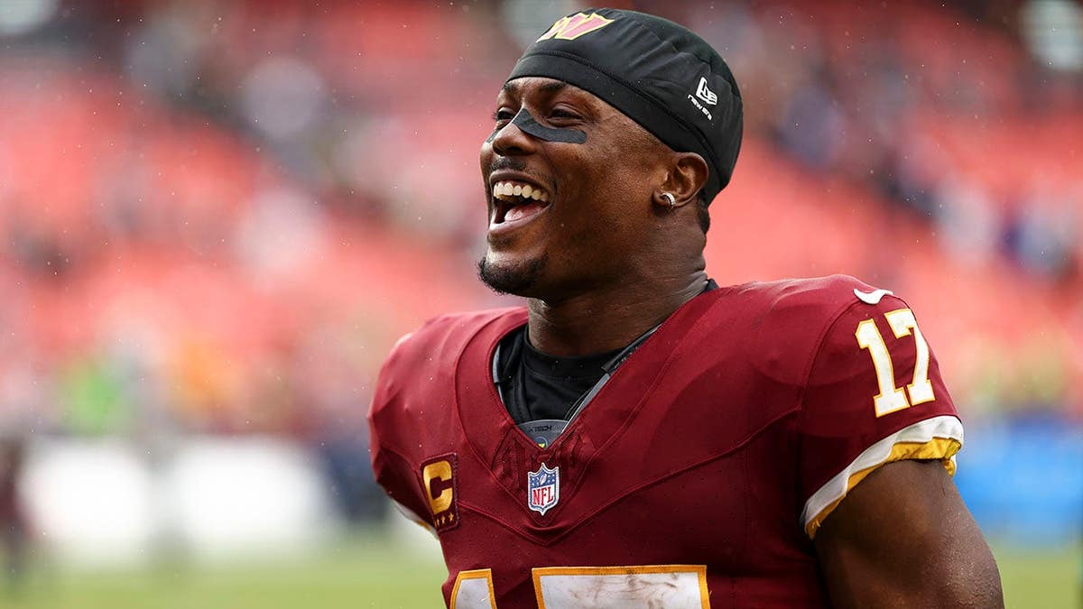 Terry McLaurin smiles after an NFL football game at Northwest Stadium.