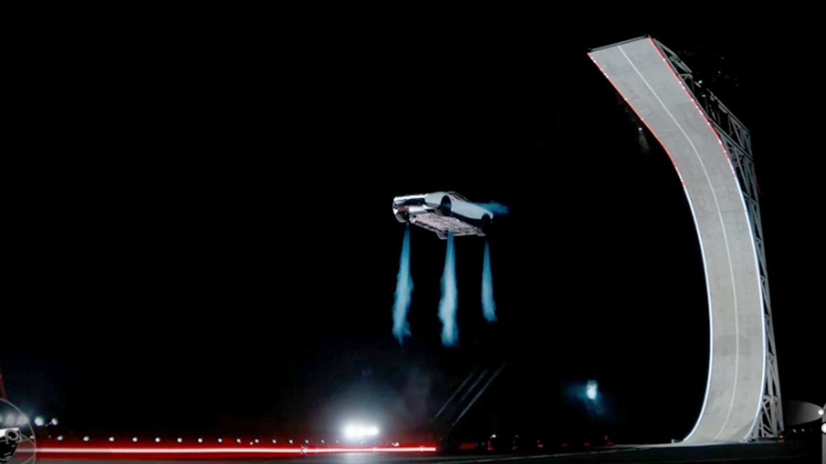 The Tesla Roadster uses thrusters in mid-air.