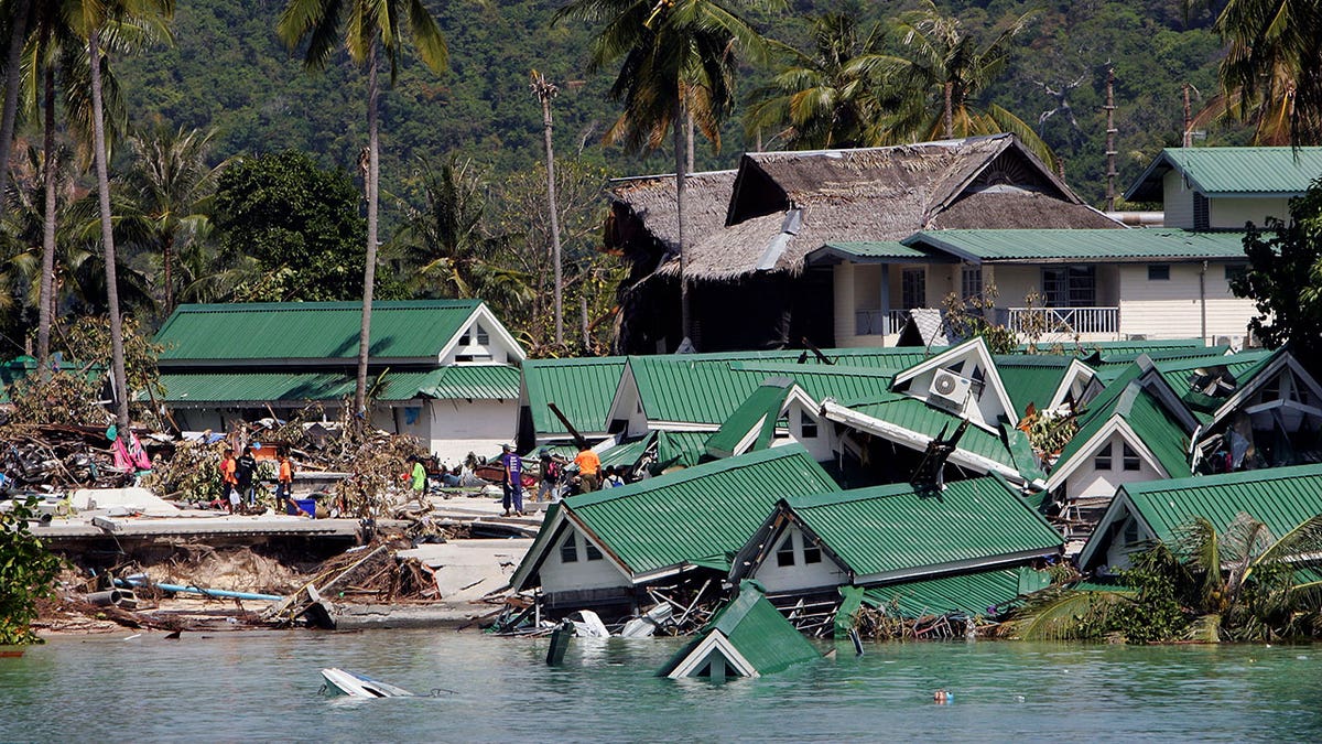 An ocean front hotel is seen collapsed into the sea close to the pier on December 28, 2004 on Kho Phi Phi, Thailand.