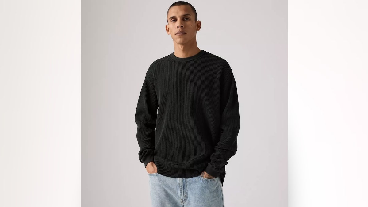 This oversized thermal has a warm waffle-knit texture.
