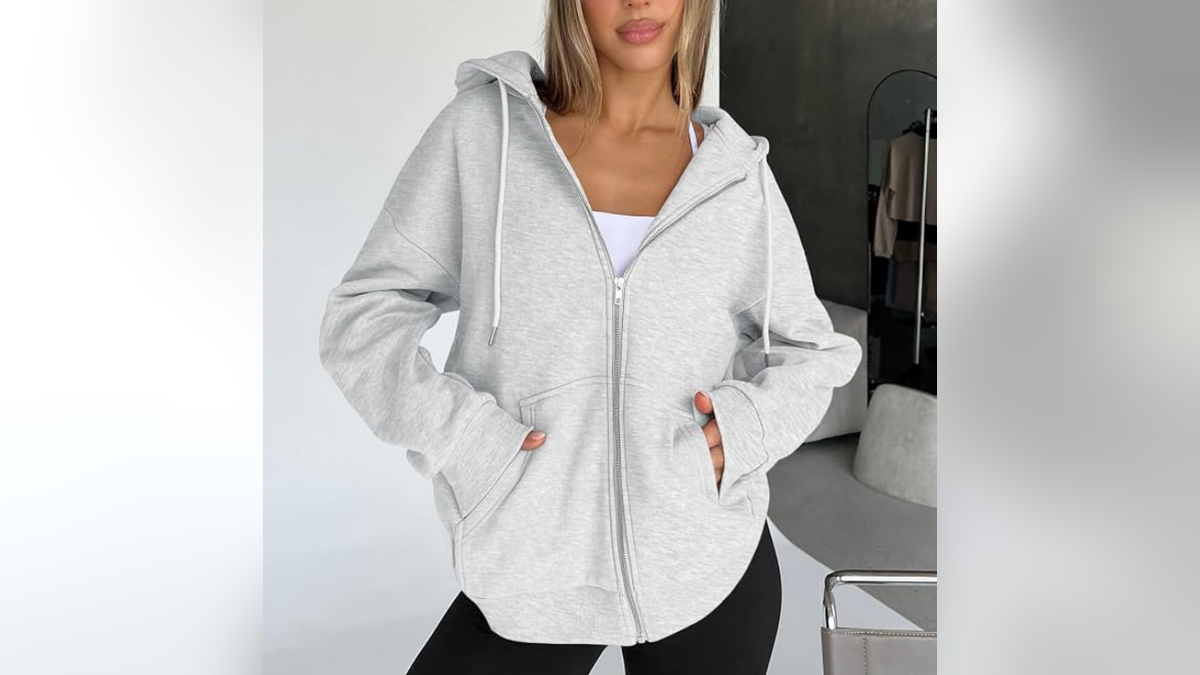 Layer up with this oversized hoodie for lounging.