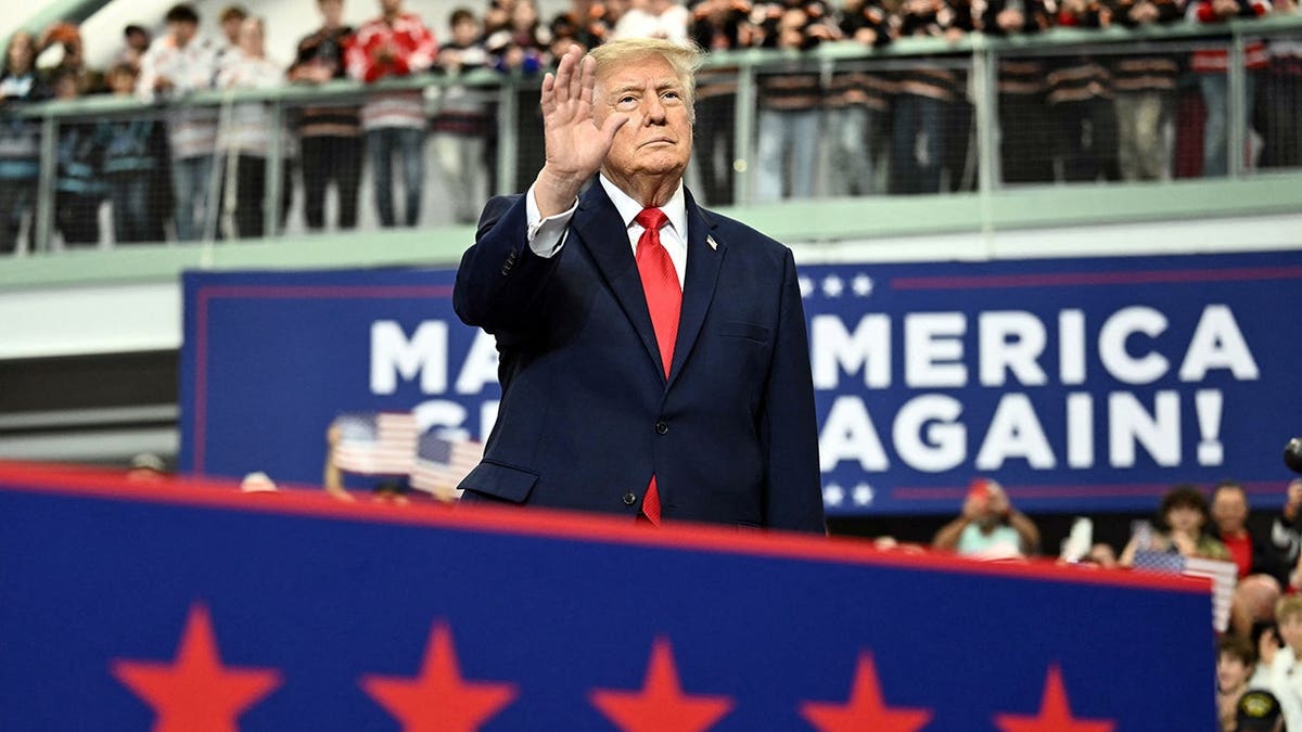 Donald Trump speaks at a campaign rally inside a sports center in Wasilla, Alaska.