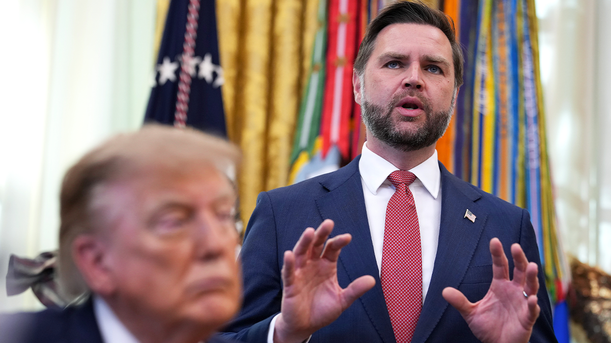 President Donald Trump listens during an Oval Office announcement on fraud whistleblower rewards