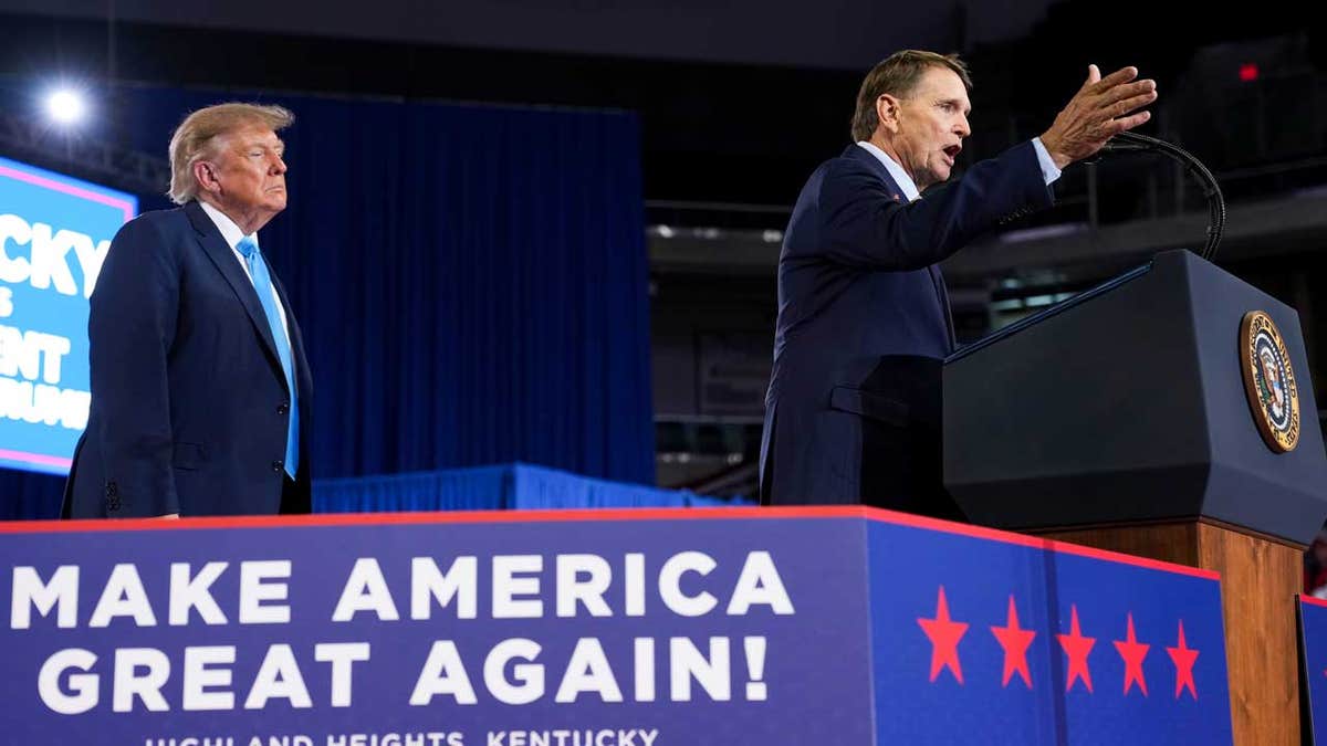President Donald Trump and congressional candidate Ed Gallrein