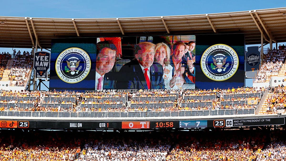 President Donald Trump displayed on the jumbotron at Neyland Stadium during a Texas-Tennessee football game.