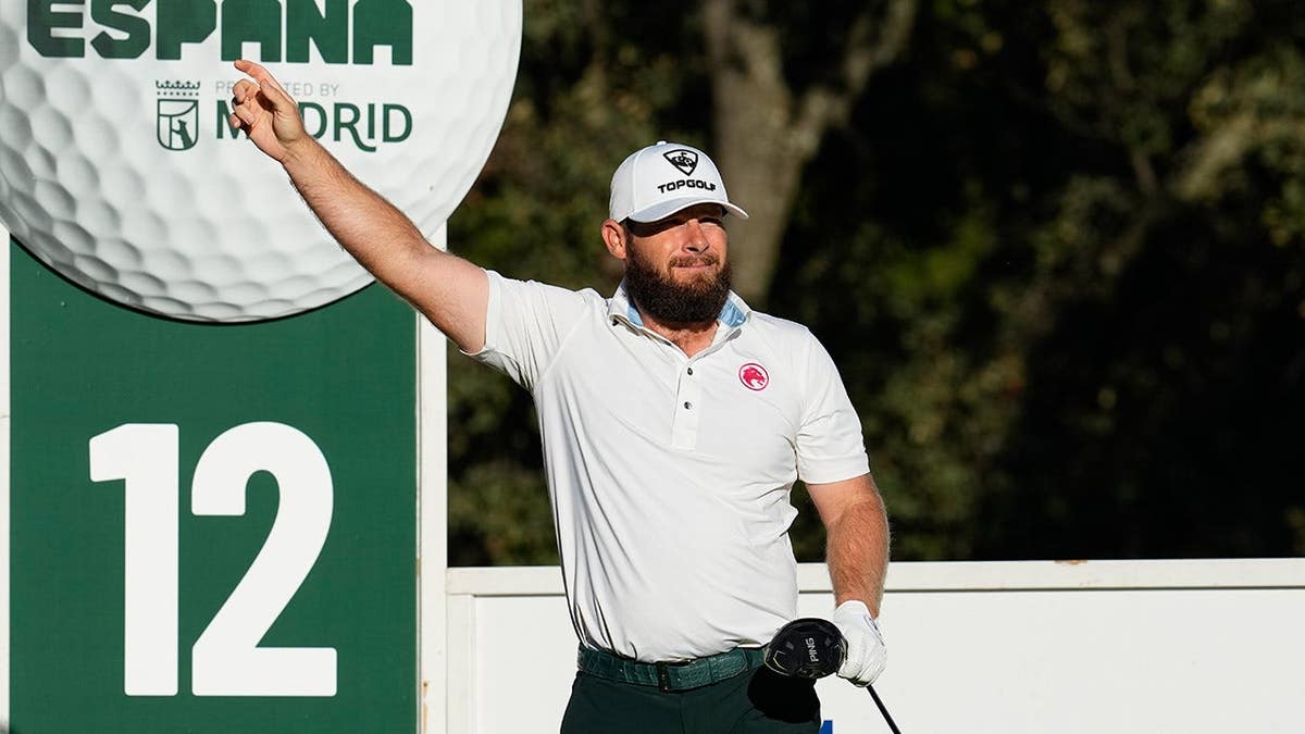 Tyrrell Hatton stands during a golf tournament in Madrid, Spain.