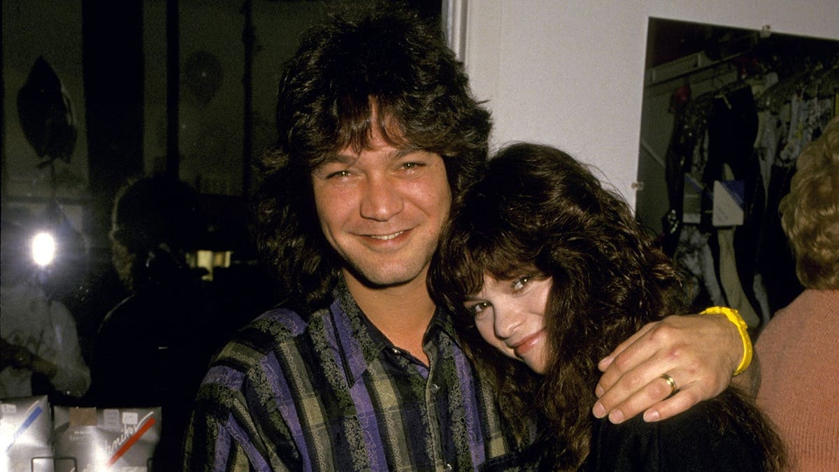 Eddie Van Halen and Valerie Bertinelli hugging in the 1980s.