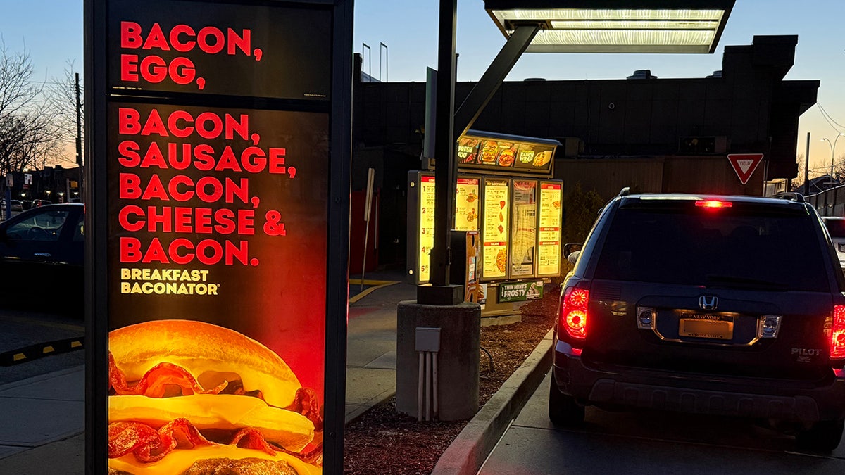 Wendy's drive-thru showing breakfast ad.