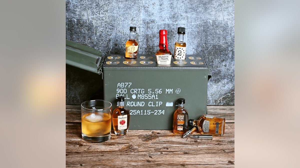 Each day, open one of 12 whiskey shots inside this real, reusable ammo can.