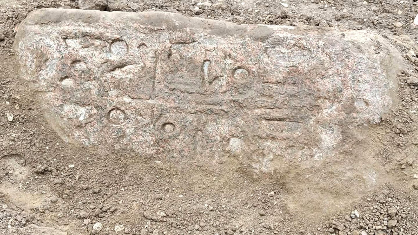 Ancient egyptian carvings on stone during excavation